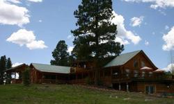 Large Log Home with 8 fireplaces & fenced Horse property on 9 acres with Spectacular Panoramic views of the San Juan Mountains. Home completely renovated in 2005. Currently being used as a Bed & Breakfast (Elkwood Manor Luxury Bed & Breakfast in Pagosa