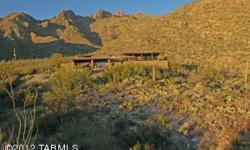 Location and Privacy! Over 7 acres adjacent to nat'l Forest! Your own private canyon in your back yard. 360 views of Tucson & the Catalina mountains. Watch the wildlife drink from the watering hole while enjoying panoramic views of Tucson. Top of the line