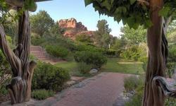 This gorgeous luxury residence overlooking scenic Oak Creek is set in one of the most beautiful areas in Sedona, with direct Cathedral Rock and Oak Creek views amidst a special natural backdrop that provides both privacy and central-area convenience.
