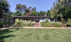 This beautiful 1930's home is located on a cul de sac in the sought out area of Linda Vista. This home offers complete privacy with tall hedges and an automatic gate in the driveway. Perfect for enjoying the So. Cal weather, many of the rooms open out to