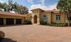 Exclusive Isleworth Golf & Country Club Estate, located just off the 5th green and fairway of the golf course. Watch the most experienced of putters from your luxurious pool, spa and patio area. Patio has a complete summer kitchen, fabulous outdoor
