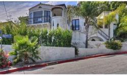 Emotionally Romantic Trophy Property. Located just above the renowned Chateau Marmont Hotel. This amazing villa sits high above the street with a private driveway. Two car garage leads to a massive finished basement entrance. The detailed appointments of