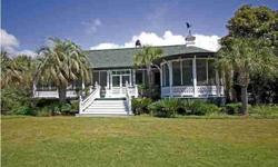 FRACTIONAL OWNERSHIP--THIS LISTING IS FOR A 1/2 OWNERSHIP SHARE OF THE HOME. WHOLE HOME IS LISTED AS MLS 1217532. Footsteps from the Atlantic Ocean, this impressive Sullivan's Island beach retreat is steeped in history. As you open the ornately carved