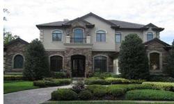 High living in Highlands of Innisbrook. This 2004 Compagna built home boasts of over 6300 square feet with 4 bedrooms and 4.5 baths. Master Suite is downstairs with sitting area and double sided fireplace. Hardwood and Travertine throughout home. Gour