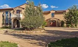 SPECTACULAR Tuscan estate with gorgeous views to Granite Mountain is a private oasis nestled on 38 lushly landscaped acres. This home will appeal to the most discriminating buyer and offers unparalleled craftsmanship throughout including solid travertine