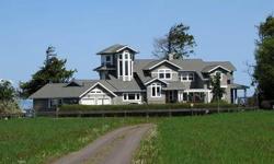 Stunning, sophisticated home on quiet, rural waterfront acreage. Professionally designed by award-winning architects to provide luxury, comfort, and magnificent views of the Strait of Juan de Fuca and the Olympic Mountains. Gorgeous entry into