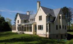 Privately situated English Manor country home on 3 acres with 325' of Lake Champlain. Exceptional lake and Green Mountain views. Custom home with open flowing floorplan, walls of windows, soaring ceilings, walls of glass. Quality features throughout.