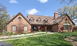Gorgeous English Tudor is ideally positioned on 10+ beautiful rolling acres in the heart of Barrington Hills. Stunning approach, towering oaks, extensive gardens...inside, the home combines grand scale with intimate, old world detailing, gourmet Kitchen