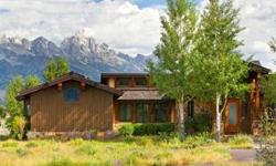Perfectly situated amidst a meadow of wild flowers, sage, and native grasses, this comfortable home offers sweeping views of the entire Teton Mountain Range and the Sleeping Indian. Completed in 2001, this home is a wonderful balance of craftsmanship and