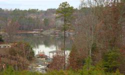 Great value on waterfront lot in fabulous Fort Mill neighborhood. Very convenient to shopping and schools. Lot is wooded, nestled in a quiet cove opening to a wide channel, great for boating and water sports.Listing originally posted at http