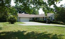4br/1.5ba "L" shaped Ranch style home with walk-out basement. .77 acres, all brick ext, 2-car garage, private rear yard and deck. Interior features incl; wall to wall carpet, family room, large laundry room, four seasons room and more. Public sewer, well,