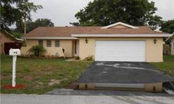 Very spacious 3/2 in sought after Palm Aire. Lovely home in quiet neighborhood. Open floor plan, Family Room, screened patio, Large kitchen, 2 car garage, walk-in closets, recessed lighting, built-ins and more. Close to park, easy access to turnpike &