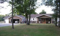 Great location close to the city of Gladstone, only 1 mile away. Beautiful 10 or 20 Acres with newer ranch home. 4/5 bedrooms, 2 baths, large living room and tongue in groove gorgeous family room. Lower level is all finished with large windows to enjoy
