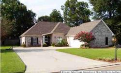 Denham Springs gem in "The Willows" subdivision. As you walk past a lovely landscaped courtyard you enter this beautiful, well maintained 3 bedroom, 2 bathroom home that offers an open floor plan with 9', 10' and 11' foot ceilings. The large kitchen is