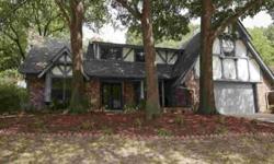 Attractive, spacious Tudor family hm. on wooded lot in beautiful Brookwood. 4(+ofc) or 5 bdrms,2.5 bths, 3 liv.areas + enclosed sunroom w/hot tub. Updated + new carpet, fresh paint.Listing originally posted at http