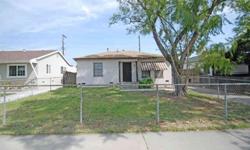 Charming single story home located in Azusa. Floor plan offers living room that leads to kitchen with separate dining area. 2 good sized bedrooms. 1 hall bathroom. Large back yard offers lots of room for entertainment, and features a healthy lemon tree.