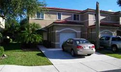 Lovely three bedroom townhome in a small, safe enclave of newer townhomes. Property has a lovely deck and an open floor plan. This townhome is just minutes to the NSU and Broward College. Rental income potential of approx $1,500 per month. End unit. Easy