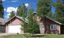 Wonderful home with an open floor plan close to Pagosa Lakes Recreation Center, Shopping, San Juan National Forest and the Pagosa Mountain Hospital. This home has vaulted ceilings, a river rock gas fireplace, 6 panel pine doors and pine trim throughout.