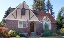 One & half blocks from popular Comstock Park and on the quieter West end of 29th. Clinker Brick Tudor w/complete remodel in kitchen,main bath, & all of first floor. Basement is all freshly painted. Master Suite has beautiful built-ins and own private bath
