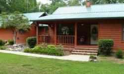 Quality built RETREAT on 2.9 acres, only 10 miles from Lake Ouachita. Surrounded by woods with a meandering creek, our 3/2 cedar ranch with new 40 year metal roof and gutter system offers amenities not found in homes in this price range. Solid woods