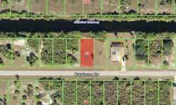Gulf access lot by going under 771 and through the Locks in South Gulf Cove. The lot next door is also available for sale from the same owner. This lot has water, sewer and is in a deed restricted subdivision called Rotonda Lakes. These lots are currently