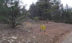 5 acres with mixed tree cover - including tall ponderosa with nearly all acres being usable and nearly flat. **INCLUDES** minerals currently owned by seller - says they own 25% and get monthly checks!!Listing originally posted at http