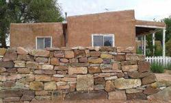 Adobe project is Historic Galisteo Village. First time on the market, hill top historic adobe, sweeping views of the Cerro Pelon Ranch, adjacent to community open space, awaits the love and care of a new resident to take it to the next level! Bring your