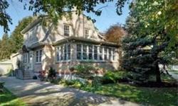East Wilmette Charmer! Just move in to this lovely sunfilled Dutch Colonial style home. Living room with cozy window seats,built in bookcases and WBFP perfect for enjoying a good book, opens to large front sunroom. Sizable Dr opens to totally renovated