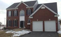 Pamper the family in this nearly new brick front colonial with open floor plan. Home features a two-story foyer, large kitchen w/island & ample cabinet/counter space, bright Family Room with gas fireplace, stunning formal dining room with tray ceiling and