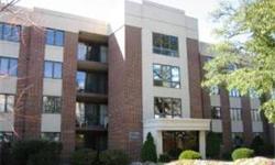 Convenient Downtown Lombard Location. Walk to Metra Train, Library, Lilacia Park, Schools, Shops, Restaurants. Spacious 2-bedroom, 2-bath condo with in-unit laundry, eat-in kitchen, separate dining room and large living room with balcony overlooking