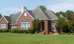 TRADITIONAL WITH EUROPEAN FLAIR BEAUTIFUL well kept brick home! Columns separating dining room & grandroom with fireplace & built-ins. 10 Ft. ceilings. Wood & tile floors. No carpet. Very nice master suite w/ trey ceilings, walk-in closet. Master bath