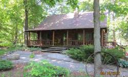 Serenity !! That's what can be said about this log home on a beautiful wooded, landscaped lot with an adjoining 1.046 acre ! 2 outbuildings, newer hickory custom kitchen with stainless steel appliances. This home also features an open loft. Boat lot