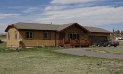 Ranch style home on 2.27 ac, zoned for horses, meadowed property, usable land, and easy access to grocery and Hwy 24. Open floor plan in the living, dining, and kitchen. Living room includes a gas freestanding stove for efficient heating, and newer