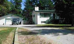 ''Spotless home & shop on 1.7 fenced acres''. Bright and airy 2,200+ Sq Ft home with new windows, new siding and newer roof, 24' covered deck, guest quarters, 4 bedrooms, 2 full baths, wood stove and much more. Bring your toys!Listing originally posted at