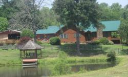 Newly remodeled 1850 sq. ft. 3/2 ranch home on 5 acres with 2 ponds and pool. Separate pastures fenced for horses with beautiful view of Lake Catoma from front porch deck! Inludes gazebo, 2 stall barn, tack room, square pen, and 1600 sq. ft. enclosed