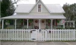 Well maintained historic home in Defuniak Springs. This warm and inviting two story home on a corner lot includes two spacious living rooms, a formal dining room, four bedrooms, butler's pantry, laundry room, office, three full bathrooms, two half baths,