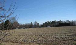 UNRESTRICTED level & gorgeous LAND plus TWO houses that have good tenants. Income is $ 750 per month for YOU! Build your own home with your builder. Wake County.Terrific location near Hwy 42. The two houses are in the corner of the lot & do not interfere