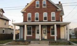 209-210 Ninth St - Brick dwelling with slate roof and 18 rooms.Home had been used as a 4 unit apartment building,2 three bedroom units and 2 one bedroom units.Home has seperate meters and two seperate garages that were rented. Good investment for rental