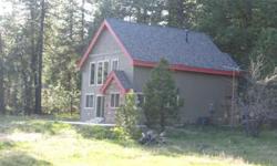 Set amidst a sun-streaked glen in the towering pines overlooking High Valley. Just like new cabin has 3 BR plus loft, 2 BA home. Gas fireplace, hardwood floors, kitchen island and patio. Beautifully finished. One bedroom & bath is on the main level. Lots