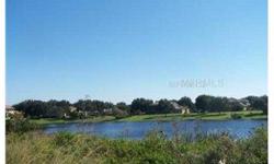 Rare find & very unique, Winter Garden "waterfront" lot in gated, "WINTERMERE HARBOR" located at the end of a beautiful cul-de-sac which make this land feel much larger & private with no neighbors ever to the left. No time frame to build and you can use