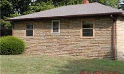 Small ranch style home with 2 bedrooms and 1 bath. Would make an exellent starter home or ideal home for 1 or 2 people. The home has a covered porch, storage shed and a 1 car portable carport. Freshly painted interior, but home does need some cosmetic