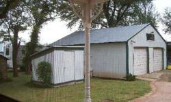 Totally remodeled, updated in 2003. 2000 sq foot home,3 bed, 2 bath,2 living areas plus sun room. New CHA,wiring,plumbing,floors,walls,gas fireplaces,custom cabinets. 2008 40x65 barn with horse stalls, office and roll up doors. 2car garage, insulated and