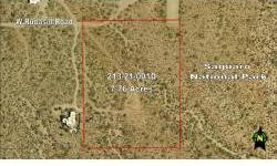 Picturesque 7.76 acres property with 662 feet immediately adjacent to Saguaro National Park. Easy build site has home site pad cleared and septic system already installed. Underground electric, phone, and Avra Valley Water to the site. Outstanding views