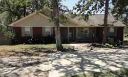 Right where you want to be. 3 bedroom 2 bath brick home on over 4 acres in South College Station. The house features a great split floor plan with the kitchen and dining area opening to the living room with a fireplace and vaulted ceilings. Master bedroom