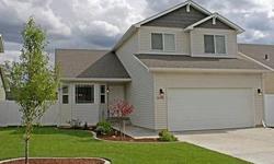 Manicured lawn and Move in Ready! This fantastic turn-key home in the Spokane Valley boasts 3 bedrooms, 3 bathrooms, and nearly 3000! Immaculately maintained and beautifully kept, this is the place for you to call home next! Low maintenance landscaping is