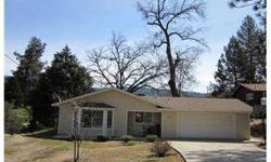 Oakhurst Custom Home conveniently located close to schools and shopping. This home was built in 2004 and offers a very open usable floor plan with 3 bedrooms, 2 baths, and a 2 car attached garage. Located on a large lot and on a quiet cal de sac! Very