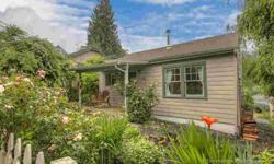 Located just steps away from Multnomah Village shops and restaurants including Lucky Lab, Village Coffee, Starbucks, and much more, this charming two bedroom one bath cottage is perfect for those looking for a simple, walkable lifestyle. Enter through the