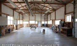 Featuring incredible views, huge acreage and one of the best three-car garage/shops you have ever seen! With over 1,800 square feet of professional shop space including electric, water and oversized ceilings all situated on a solid concrete pad, this shop