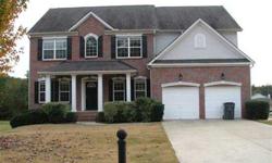 STUNNING TWO STORY BRICK FRONT HOME IN SWIM/TENNIS/GOLF COMMUNITY. AS YOU ENTER THE FOYER OF THE HOME YOU WILL FIND THE SEPARATE DINING ROOM TO YOU RIGHT AND A LIVING ROOM TO YOUR LEFT. A FULL BATH AND BEDROOM IS LOCATED ON THE MAIN LEVEL. THE FIRESIDE