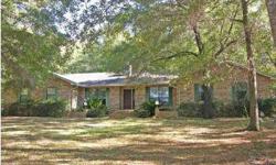 Short Sale. Everything you want in a home and more, plus the seller pays closing costs! Situated on a large well shaded lot, this all brick home is across from the neighborhood lake, which you have access to and a view of it certain times of the year.